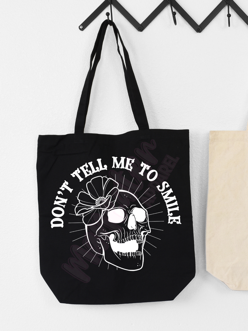 don't tell me to smile tote bag